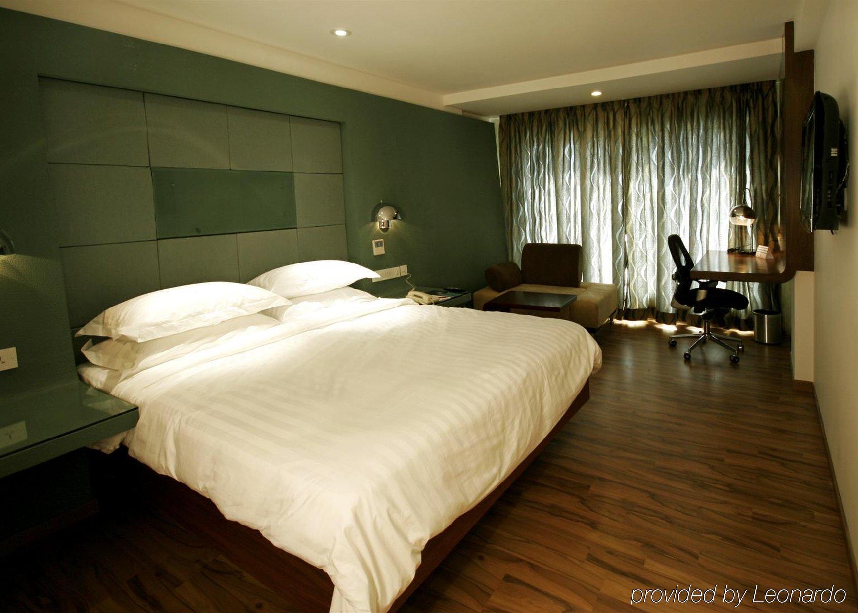 Hotel Trinity Isle Μπανγκαλόρ Δωμάτιο φωτογραφία